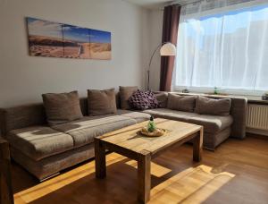 Posezení v ubytování Die kleine Auszeit Appartementanlage Wiking - nur wenige Schritte zum Meer