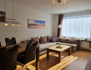 Posezení v ubytování Die kleine Auszeit Appartementanlage Wiking - nur wenige Schritte zum Meer