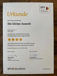 Certifikát, hodnocení, plakát nebo jiný dokument vystavený v ubytování Die kleine Auszeit Appartementanlage Wiking - nur wenige Schritte zum Meer
