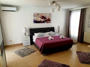 Posteľ alebo postele v izbe v ubytovaní Villa Avoca