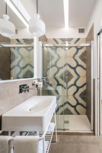a bathroom with a sink and a shower at Santa Maria Vecchia Relais in Vico Equense +69 photos