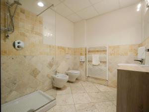 Koupelna v ubytování Hotel Arezzo ASC