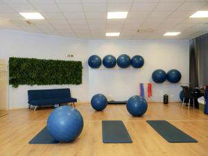 Fitness centrum a/nebo fitness zařízení v ubytování Hotel Arezzo ASC