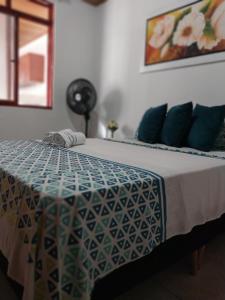 Ένα ή περισσότερα κρεβάτια σε δωμάτιο στο Encantador apartamento