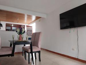 Μια τηλεόραση ή/και κέντρο ψυχαγωγίας στο Encantador apartamento