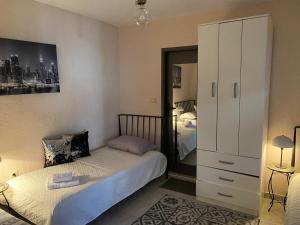 Postel nebo postele na pokoji v ubytování Apartmani Padrov