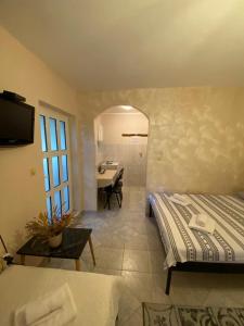 Postel nebo postele na pokoji v ubytování Apartmani Padrov