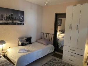 Postel nebo postele na pokoji v ubytování Apartmani Padrov