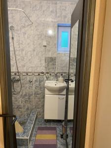 Koupelna v ubytování Apartmani Padrov