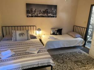 Postel nebo postele na pokoji v ubytování Apartmani Padrov