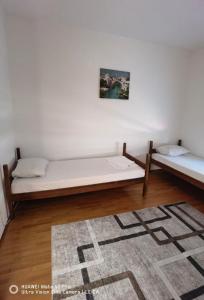 Postel nebo postele na pokoji v ubytování Lovely Bosnian Home
