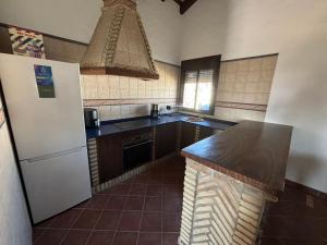 Kuchyň nebo kuchyňský kout v ubytování Villa Los abuelos
