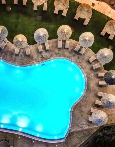 Bazén v ubytování Evia Hotel & Suites nebo v jeho okolí