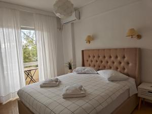 Postel nebo postele na pokoji v ubytování Hotel Rania