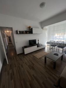 TV a/nebo společenská místnost v ubytování Torrenostra Apartment