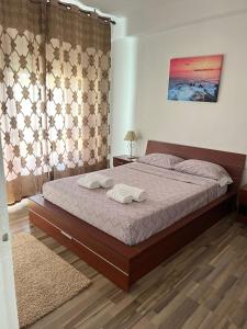 Postel nebo postele na pokoji v ubytování Torrenostra Apartment