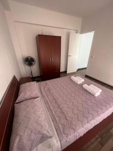 Postel nebo postele na pokoji v ubytování Torrenostra Apartment