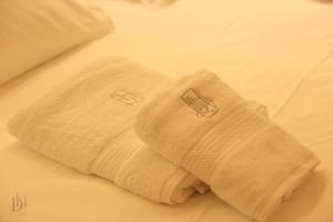 Postel nebo postele na pokoji v ubytování DeHa Rooms & Apartments + 125 fotografií