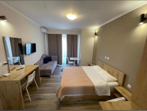 Postel nebo postele na pokoji v ubytování Resol Hotel