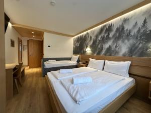 Postel nebo postele na pokoji v ubytování Active Hotel Gran Zebru'