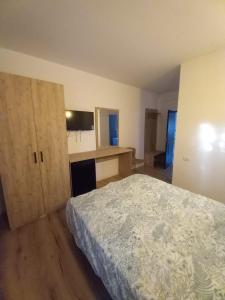 Postel nebo postele na pokoji v ubytování VILA SAMI