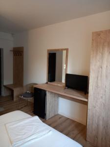 Postel nebo postele na pokoji v ubytování VILA SAMI