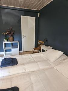 Postel nebo postele na pokoji v ubytování Lilla Älvbrogården i stan