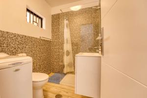 Kúpeľňa v ubytovaní Appartamento con 1 camera da letto con vista OV223