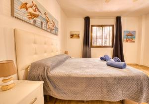 Posteľ alebo postele v izbe v ubytovaní Appartamento con 1 camera da letto con vista OV223