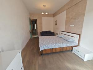 Postel nebo postele na pokoji v ubytování Luxury Apartment III
