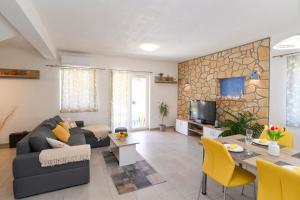 TV a/nebo společenská místnost v ubytování Vacation house Ulika