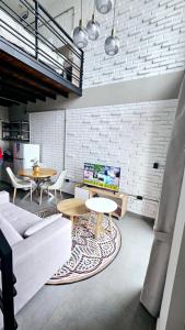 Posezení v ubytování Departamento Loft Costanera Brete