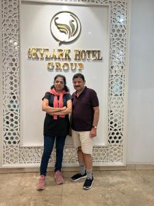 a man and a woman standing in front of a store at Skylark Boutique and Spa in Hanoi +15 photos