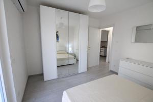 Postel nebo postele na pokoji v ubytování Appartamento Valkiria