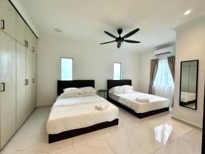 Postel nebo postele na pokoji v ubytování BNB Country Homestay, Rawang - 20 pax, pool, event + 39 fotografií