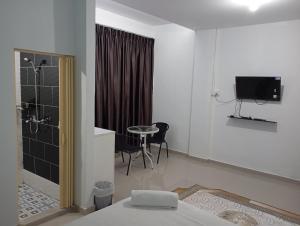 Μια τηλεόραση ή/και κέντρο ψυχαγωγίας στο Guest House