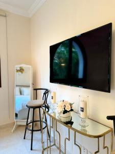 TV a/nebo společenská místnost v ubytování Salalah Hawana Marina Apartment