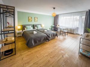 En eller flere senge i et værelse på ImmoStay D# City Apartment - Modern & WiFi