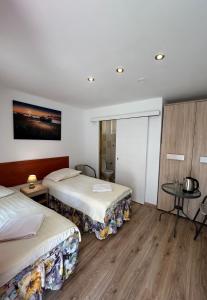 Posteľ alebo postele v izbe v ubytovaní Stilo Hotel