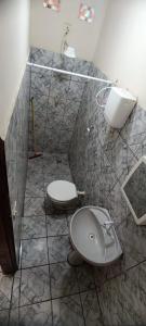 Ένα μπάνιο στο Arraial Hospedagens