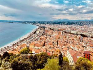 an aerial view of a city and the beach at Studio cosy près du port in Nice