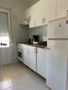 Kuchyň nebo kuchyňský kout v ubytování Torrenostra Apartment