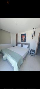 Katil atau katil-katil dalam bilik di IOLENA Seaview Apartment