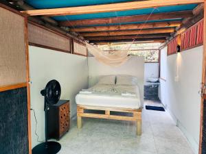 Postel nebo postele na pokoji v ubytování El Hamaquero Hostal EcoNativo