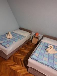 A bed or beds in a room at Ágnes Pihenőház