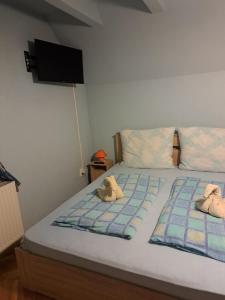 A bed or beds in a room at Ágnes Pihenőház