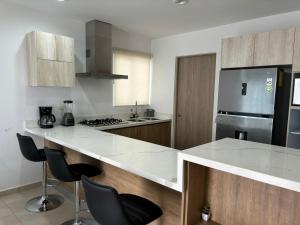 Η κουζίνα ή μικρή κουζίνα στο Almarena Frente al Área Común 4min playa