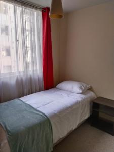 En eller flere senge i et værelse på Departamento Marina + 4 billeder