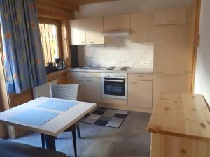 Kuchyň nebo kuchyňský kout v ubytování Appartement Claudia