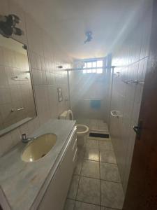 Koupelna v ubytování Apartamento amplo e confortavel + 2 fotografie